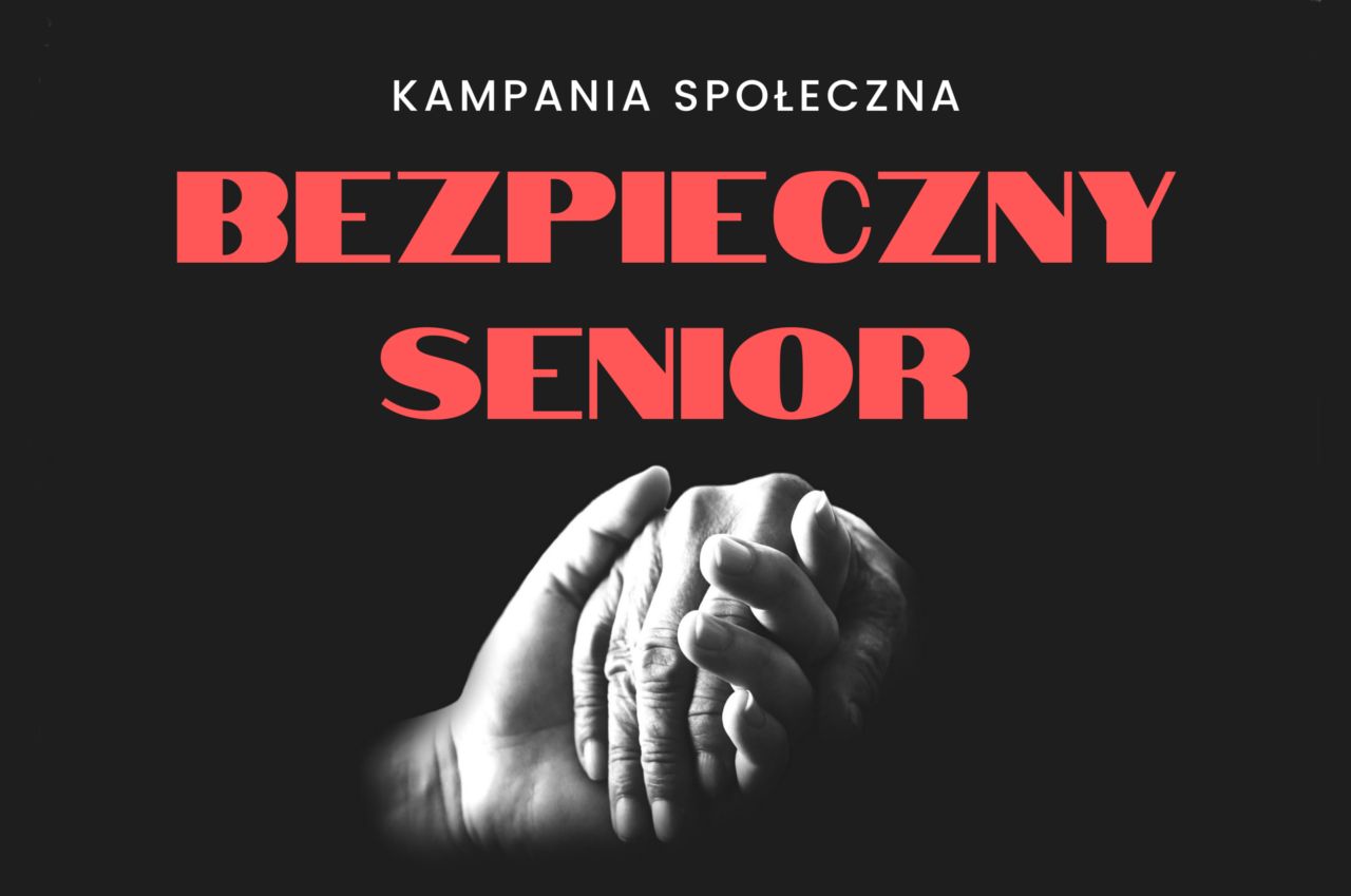 Biało czerwony napis kampania społeczna Bezpieczny Senior poniżej młoda dłoń  podtrzymuje drugą starszą 